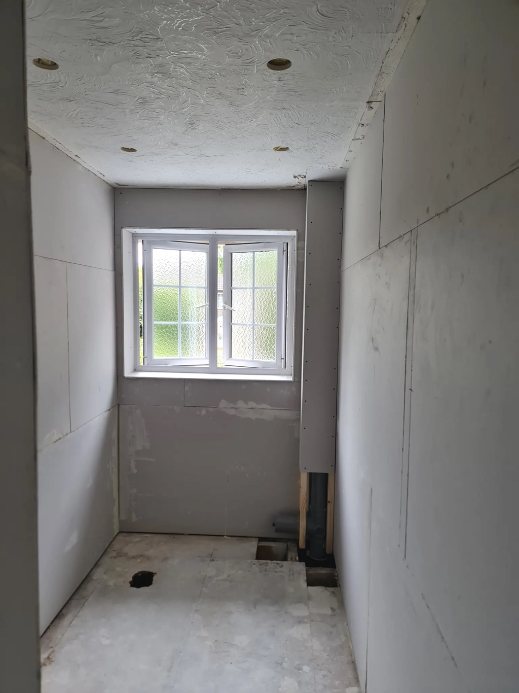 Completely bare bathroom before refitting